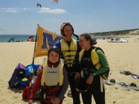 Happy kitesurfing familly at Tarifa Max kitesurfing school in Valdevaqueros kite beach