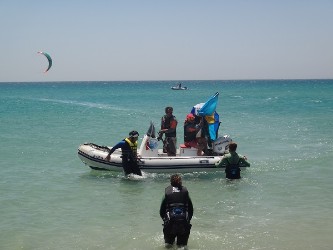 Tarifa Max kitesurfing boat rescue ion Los Lances beach Tarifa kite spot with Tarifamax kitesurf school. Book your kitesurfing lesson at info@tarifamax.net